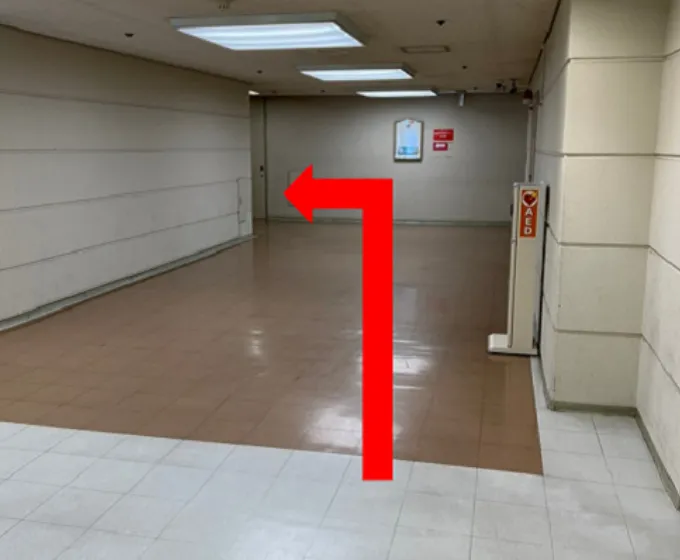 9.Exit the elevator, go straight, and then turn left.